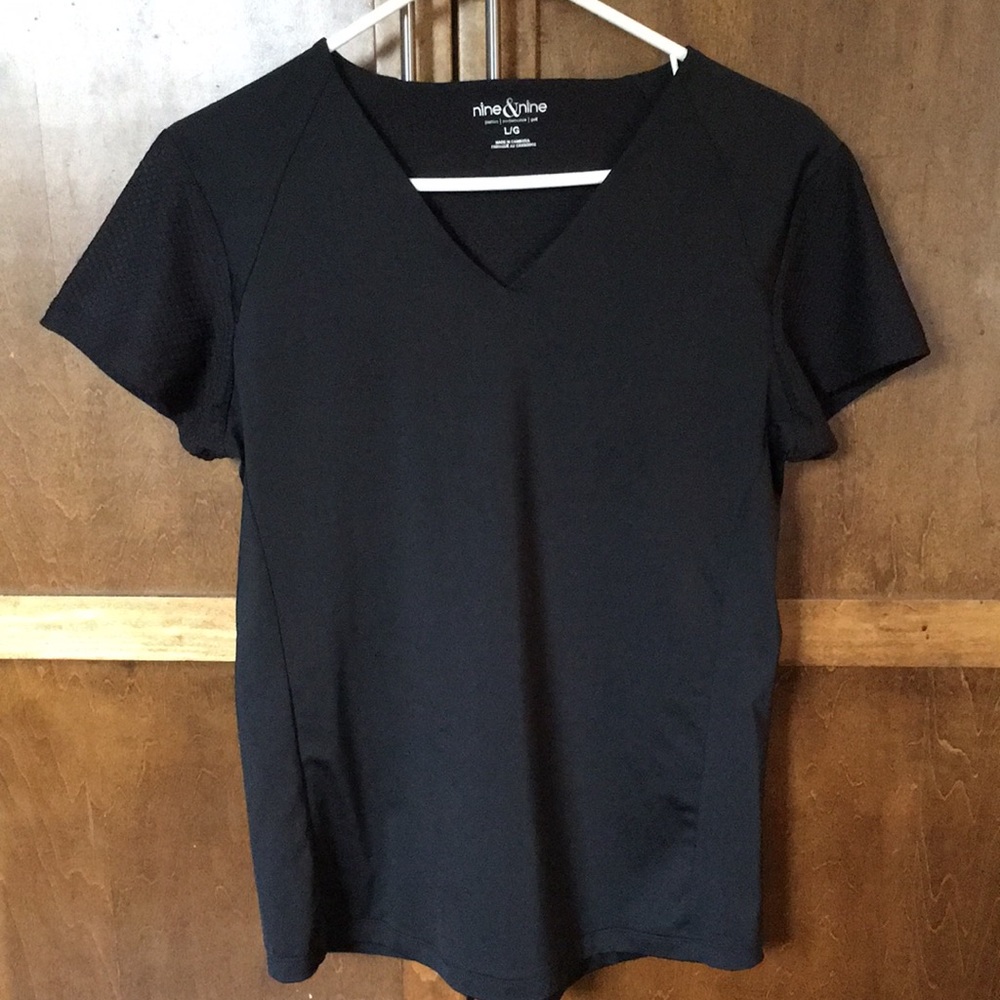 Nine &Nine black golf t-shirt.